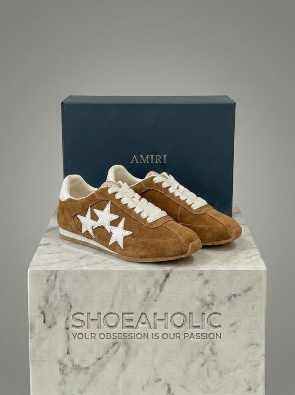 Shoe rendering with pedestal logo 202604301157